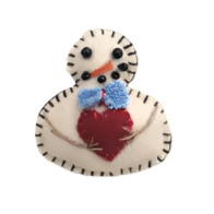 A handmade pin badge featuring a snowman with a red heart, primarily crafted from felt.