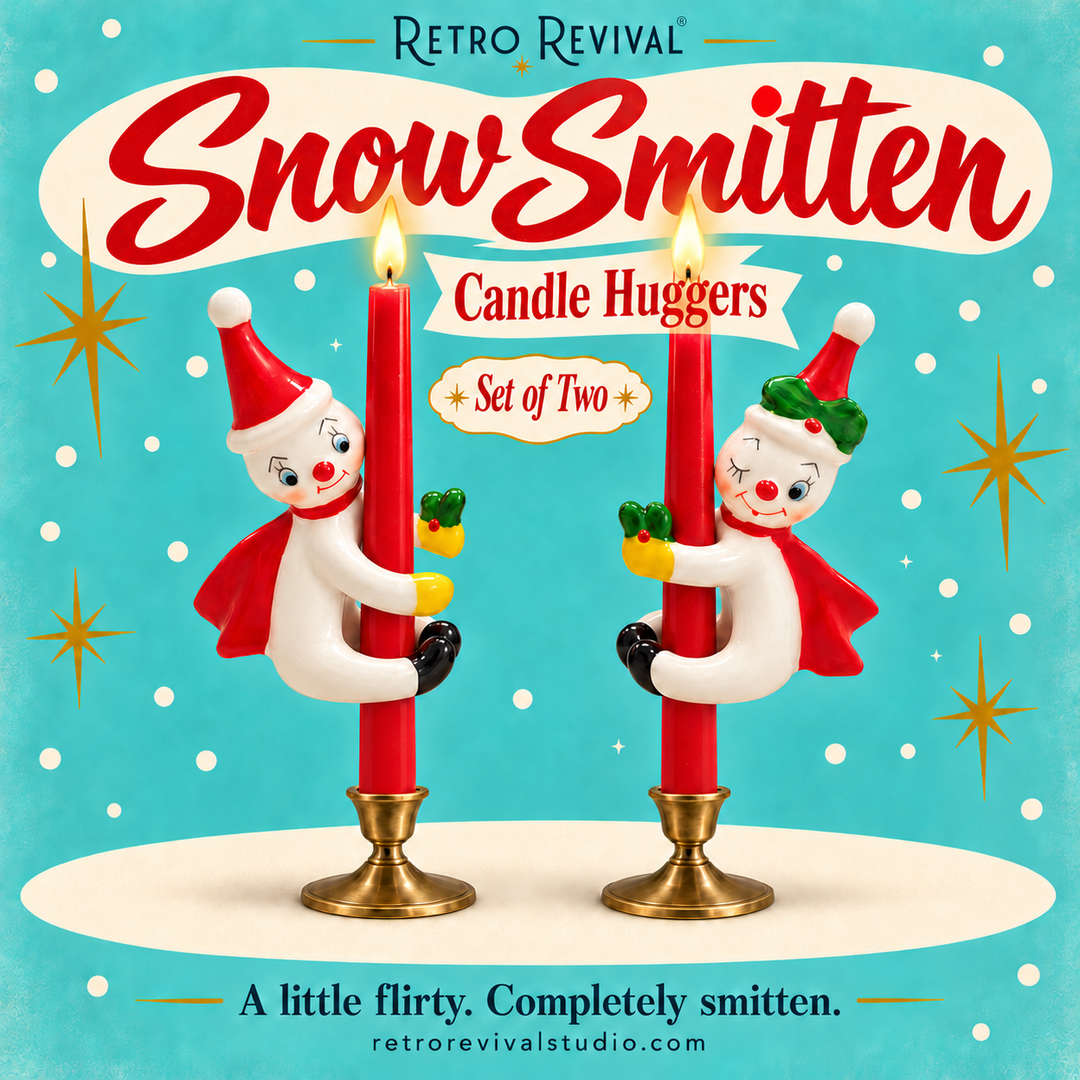 Snow Smitten snowman candle huggers by Retro Revival hugging two red taper candles in brass candlesticks