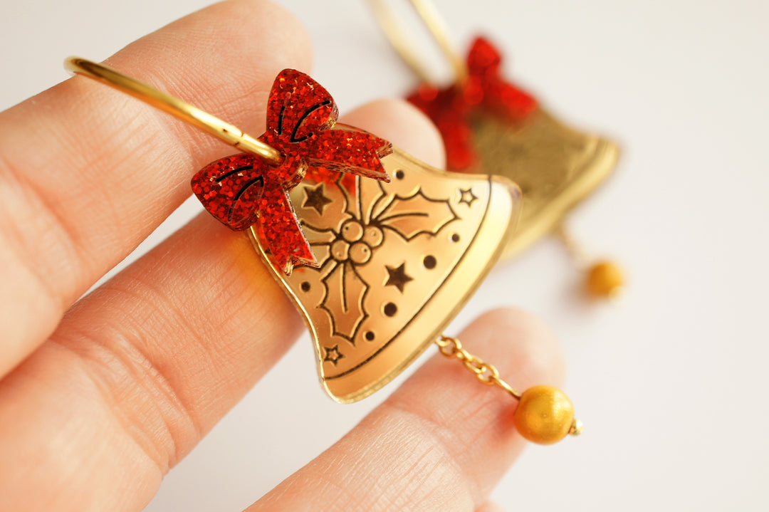 Gold Christmas bell earrings worn, LaliBlue Christmas jewelry, hoop earrings