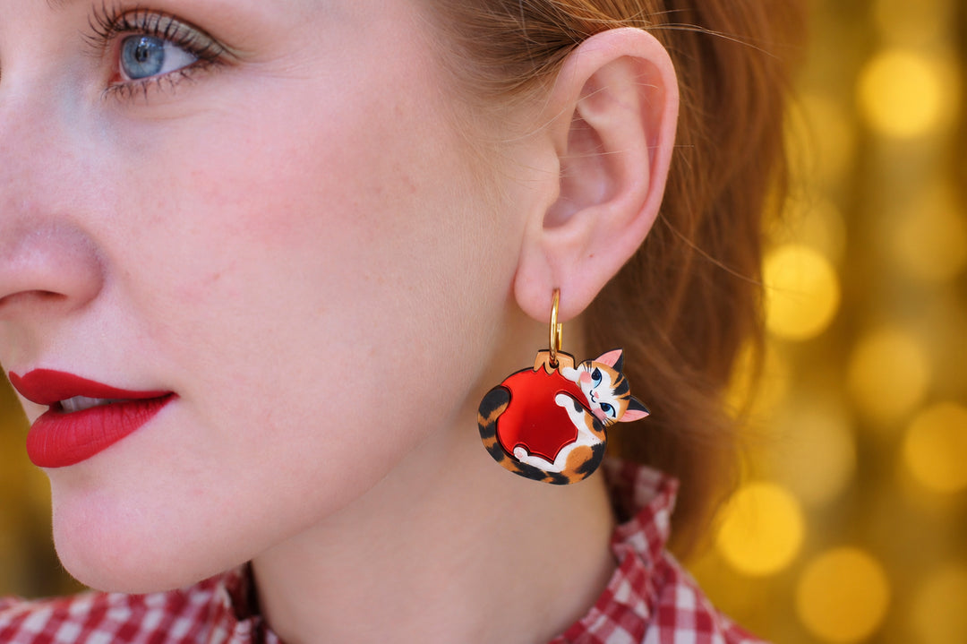 Kitten Christmas ornament earrings close up, LaliBlue, Christmas jewelry, cat, mirror acrylic