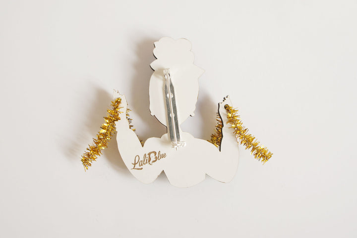 Girl With Tinsel Brooch by Laliblue