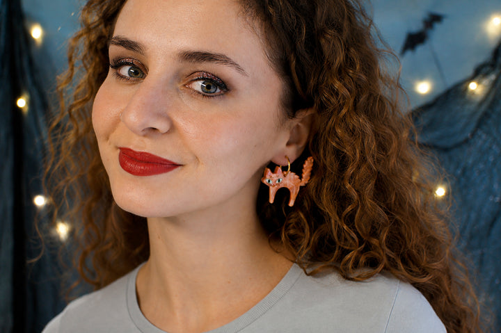Scared Halloween cat earrings worn — laser cut acrylic jewelry — LaliBlue Midnight Cinema