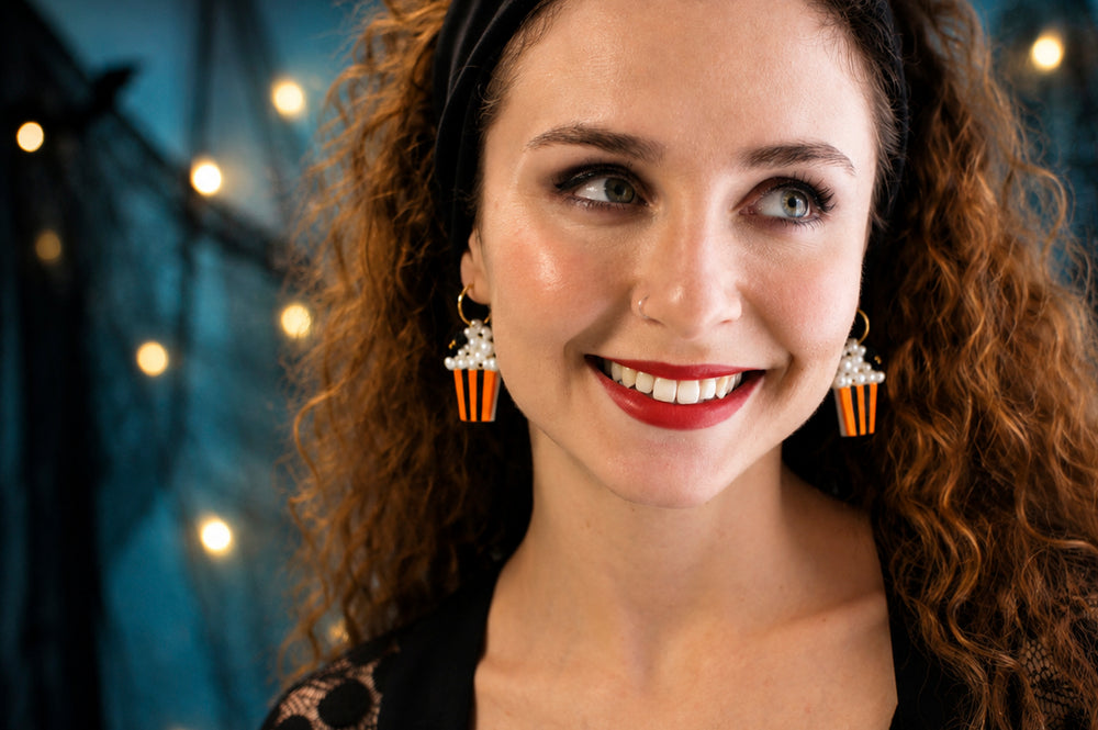 Halloween popcorn bucket and spider earrings detail — acrylic novelty cinema jewelry — LaliBlue Midnight Cinema