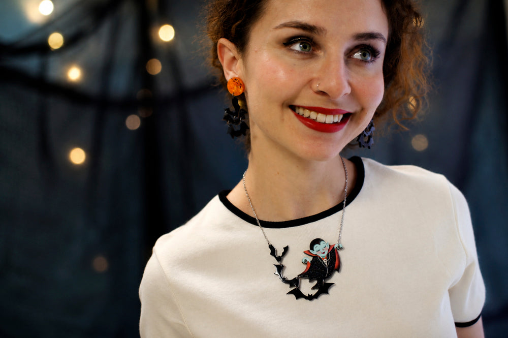 Dracula flying bats necklace detail — articulated Halloween acrylic illustrated wood jewelry — LaliBlue Midnight Cinema
