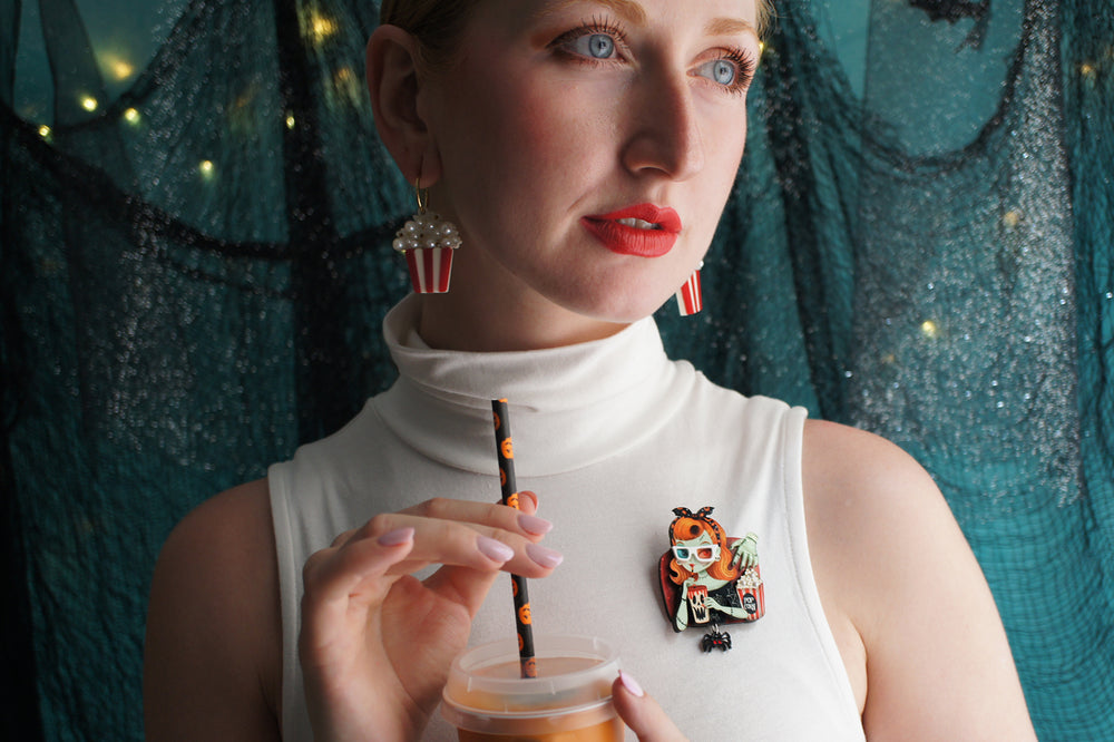 Zombie girl brooch detail — cinema viewer with popcorn and spider — Halloween acrylic glitter jewelry — LaliBlue Midnight Cinema