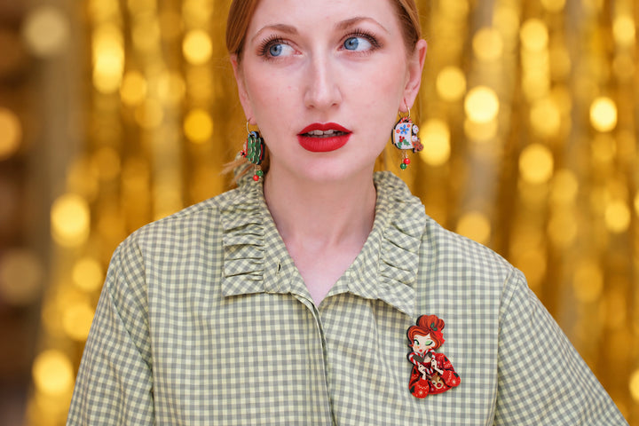 Candy cane girl brooch detail, LaliBlue Christmas jewelry, redhead, candy cane