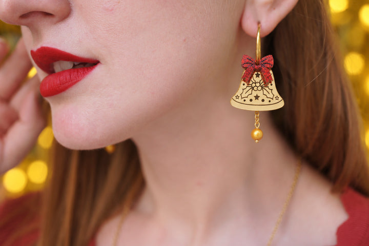 Gold Christmas bell earrings detail, LaliBlue Christmas jewelry, bells, holly, glitter