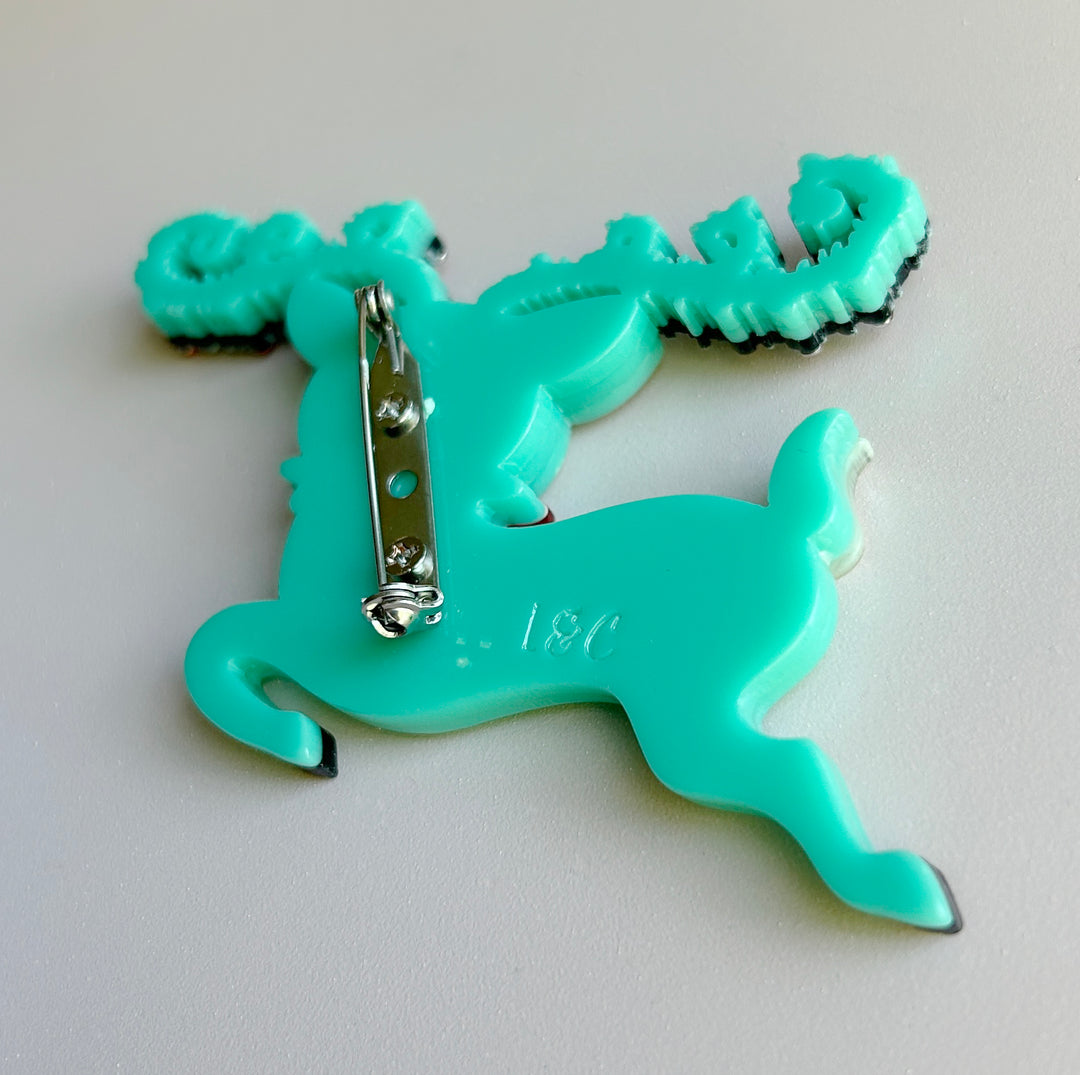 Locking clasp on the back of the Fawna Fir Top Leaping Reindeer brooch by Johanna Parker and Lipstick & Chrome. Holiday deer pin.
