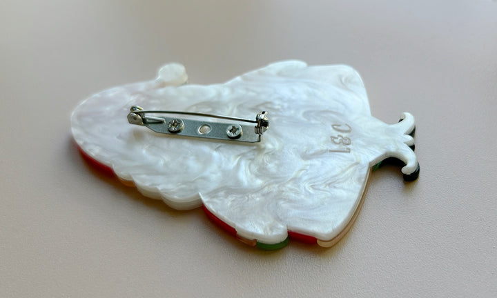 Photo featuring the locking clasp on the Jolly Old Elf Christmas brooch by Johanna Parker and Lipstick & Chrome. Holiday Santa pin.