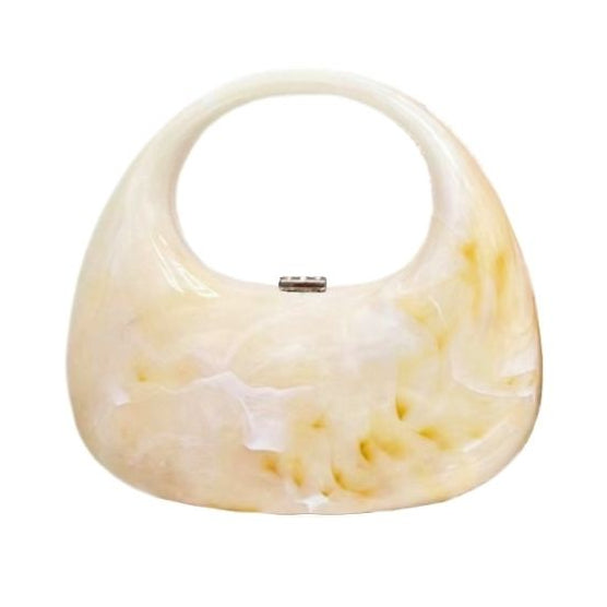 Marbled beige and white handbag on a white background