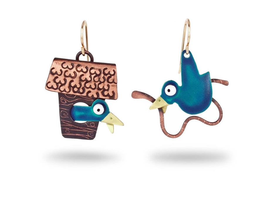 Chickenscratch Bluebird Mismatched Earrings — handmade brass enamel bluebird in copper birdhouse earrings with copper worm, cause and effect narrative design, gold-filled ear wires, 1999 original
