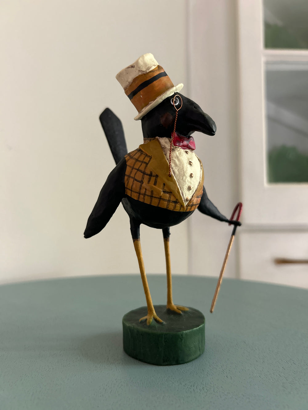 Folk art dapper crow in top hat with cane