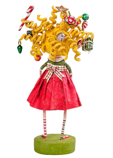 Decorative figurine with yellow hair and a red dress on a gray background
