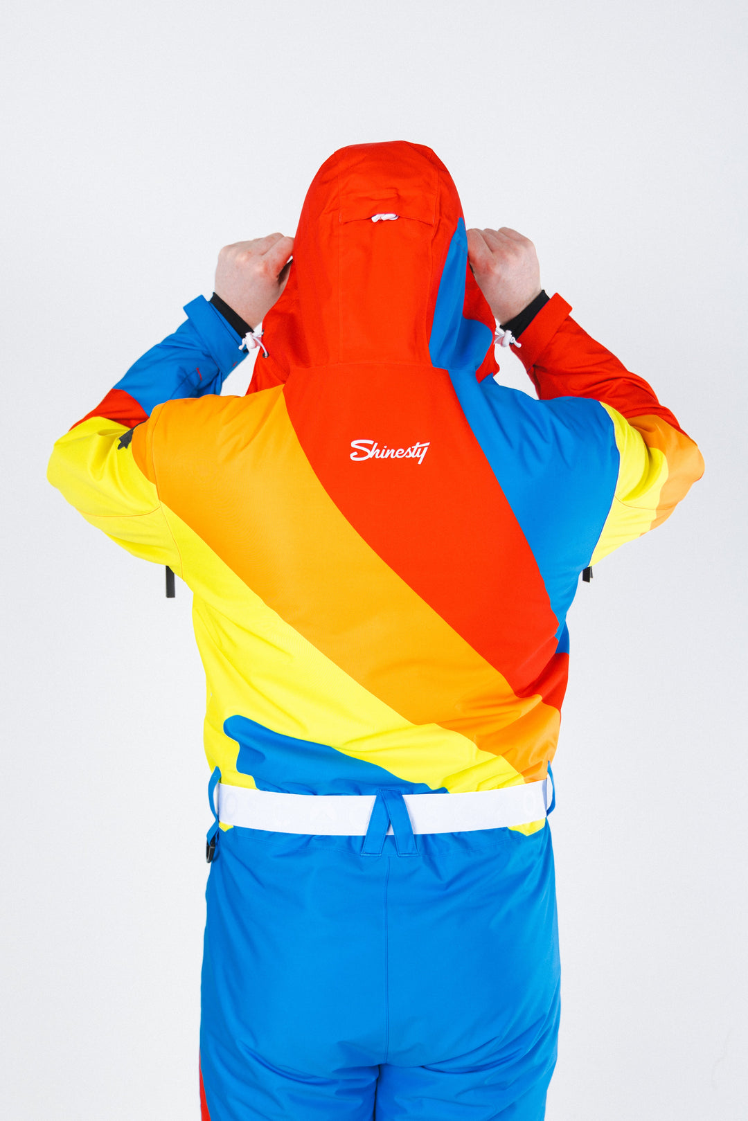 The Groovy Gondola | Orange Retro Swirl One Piece Ski Suit