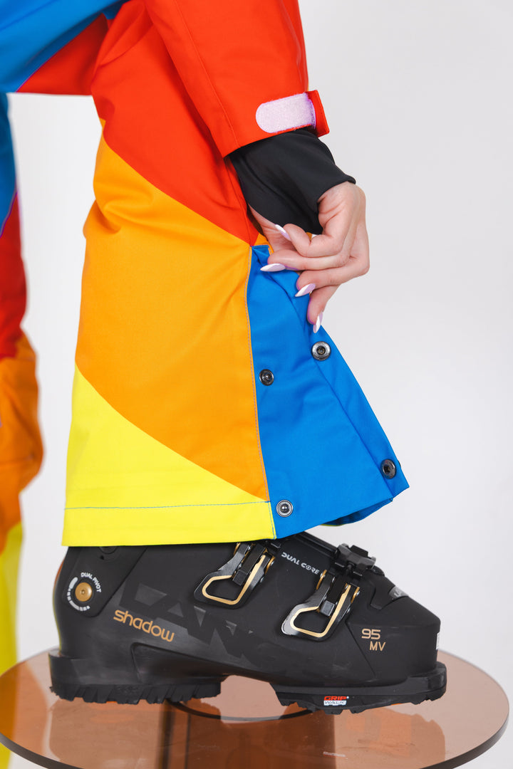 The Groovy Gondola | Orange Retro Swirl Women's One Piece Ski Suit