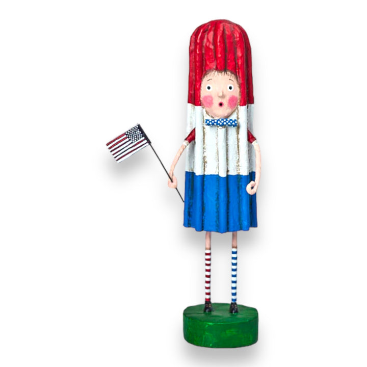 A figurine of a whimsical character named Rodney Rocket Pop, designed by Lori Mitchell. The figure stands 7.