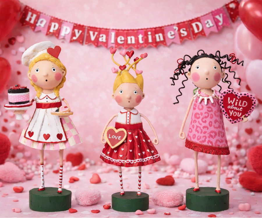 Three lori mitchell decorative figurines on a Valentine's Day-themed background with balloons and hearts. SALE
