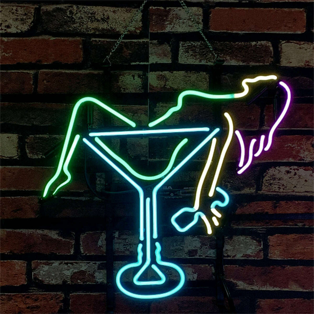 Neon sign of a cocktail glass with a woman's silhouette 