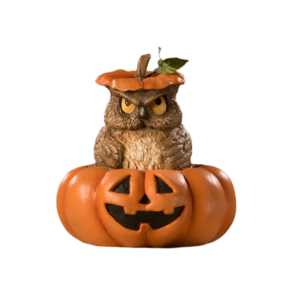 A decorative figurine of an owl with a jack o'lantern on its head, predominantly orange and black, designed for Halloween decor.