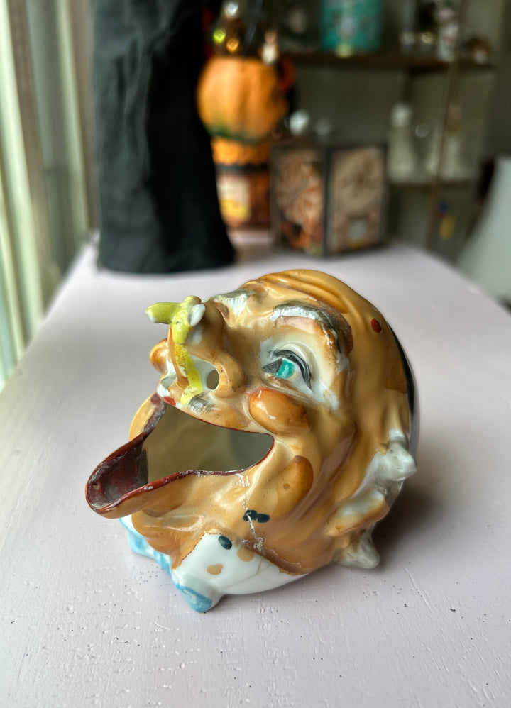 Old man ashtray side angle