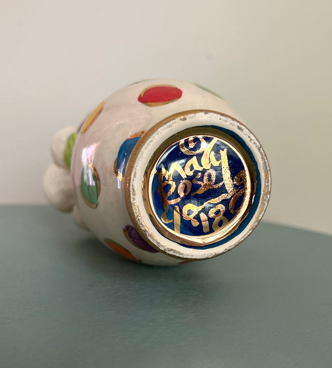 Signed base of polka dot vase