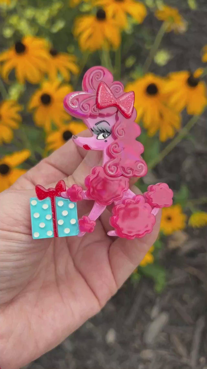 Video featuring the Mimi Loves Christmas brooch by Miss Fluff and Lipstick and Chrome. Holiday pink poodle pin.