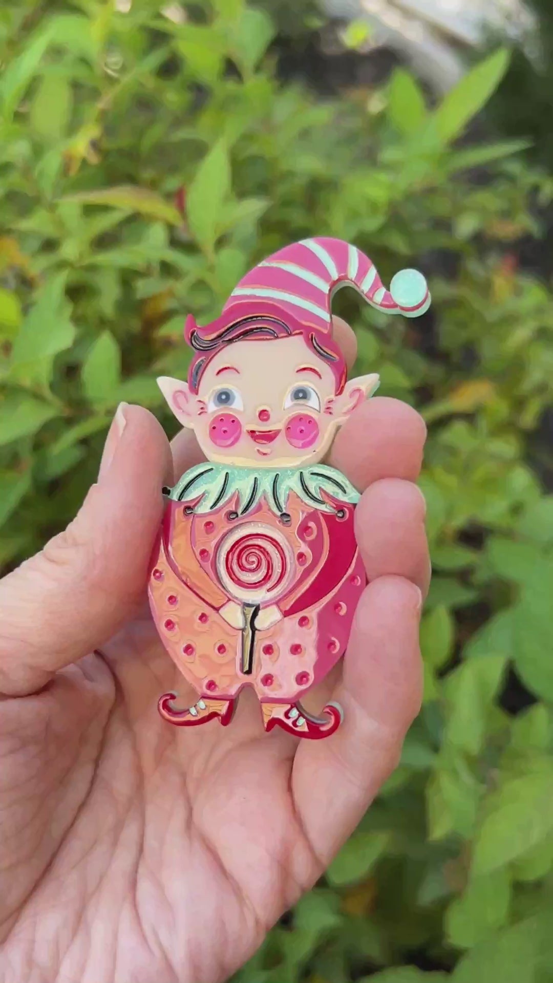 Video featuring the PINK North Pole Apprentice brooch by Johanna Parker and Lipstick and Chrome. Christmas holiday elf pin.