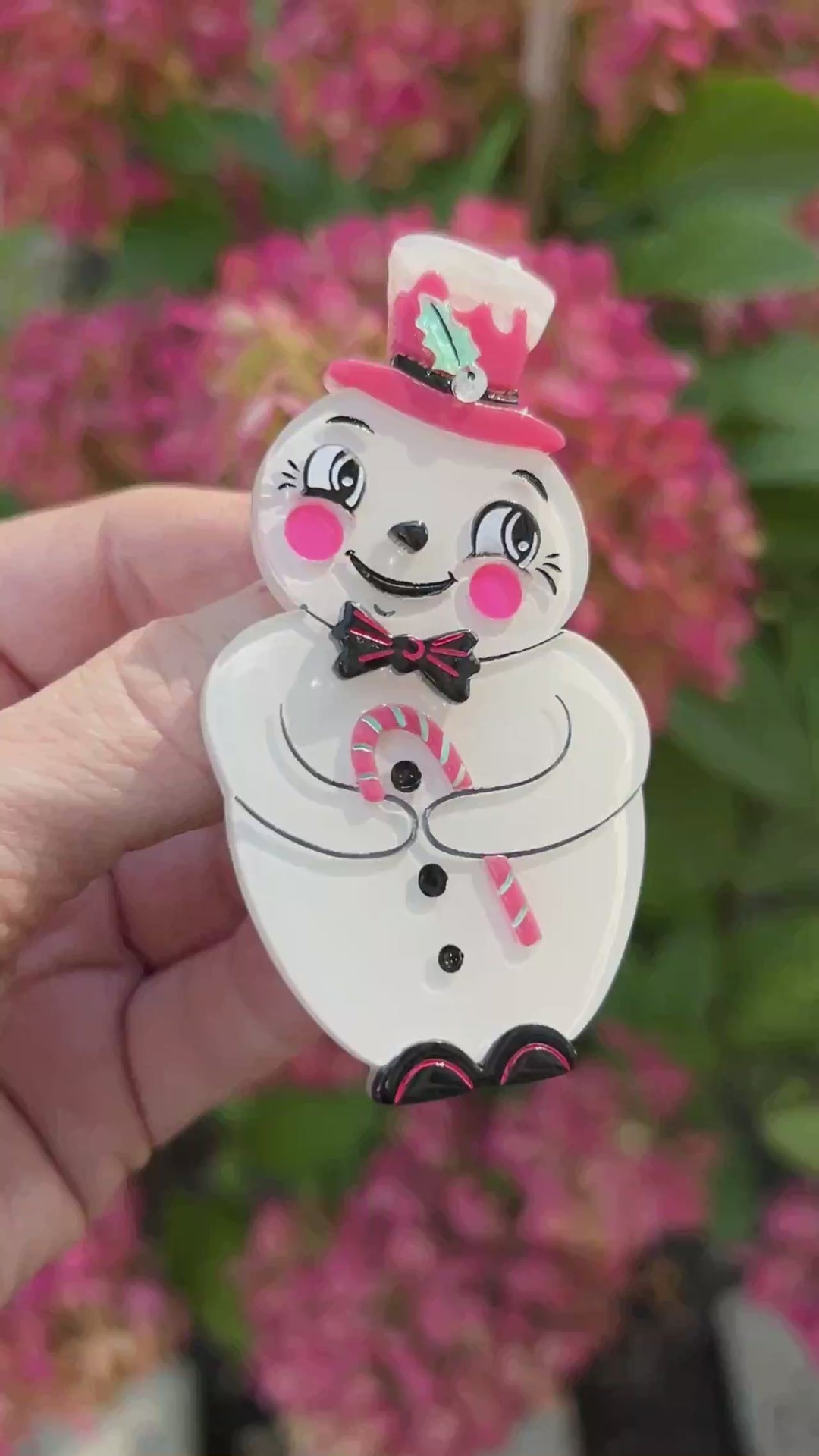Video featuring the Love at First Sight Snowman brooch by Johanna Parker and Lipstick and Chrome. Pink holiday Frosty pin.