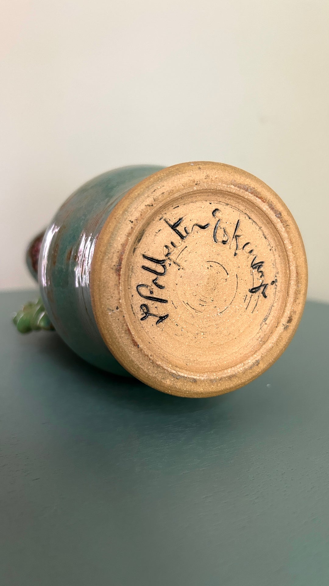 Artist signature on vase base