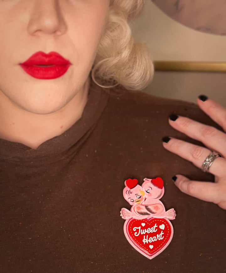Tweet Heart acrylic brooch with pink sparkle and candy heart, styled with vintage Valentine's props