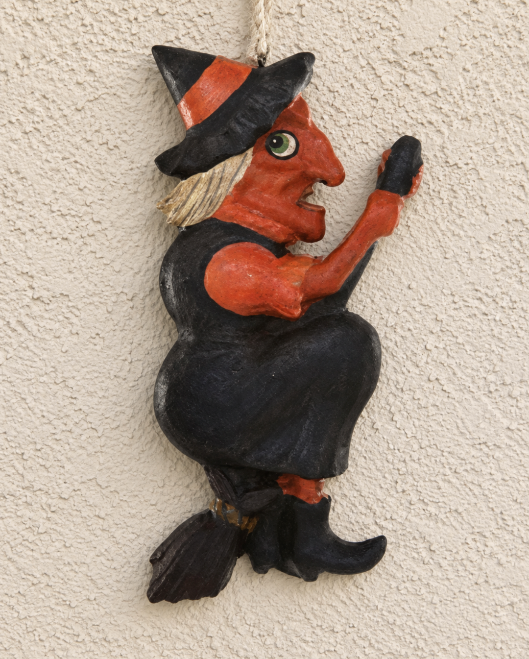 Vintage witch hanging Halloween wall decor.