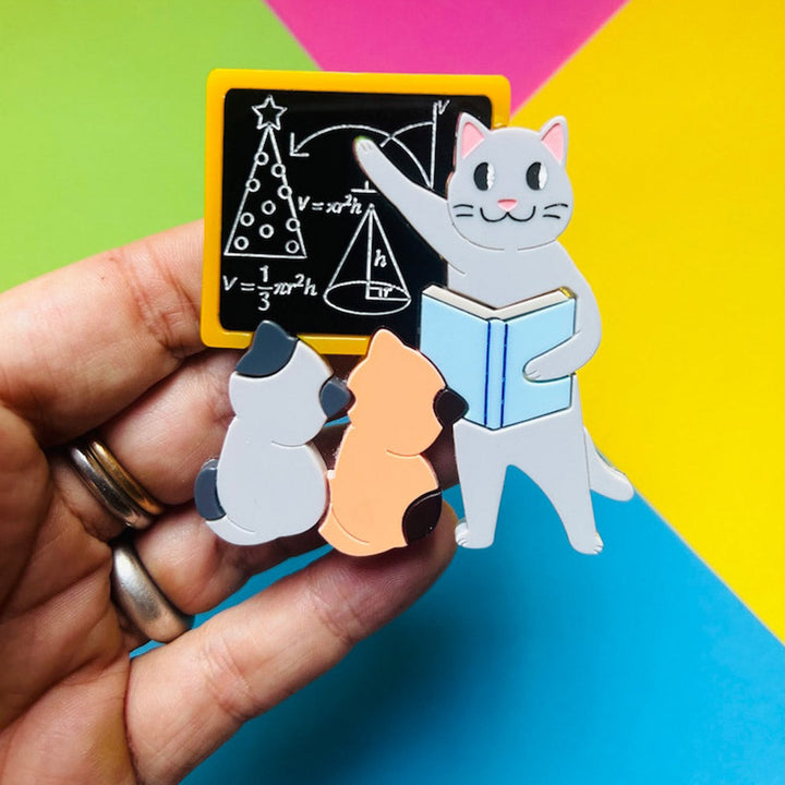 Meowy Christmas Collection - "Cat Teaching How to Conquer The Christmas Tree" Acrylic Brooch by Makokot Design
